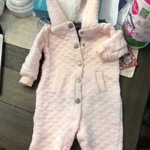 pink long sleeved quilted one piece with hood